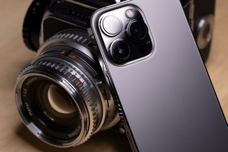 A person recording video with a smartphone