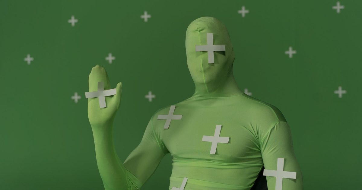 A performer in a motion-capture suit with tracking markers