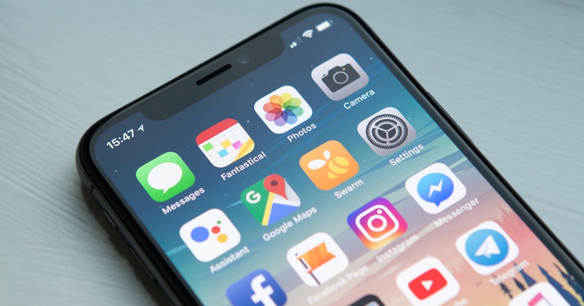 Space gray iPhone showing app interface