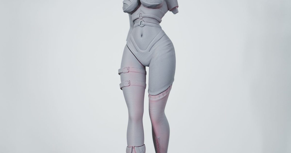 A posed 3D character figurine on a plain background