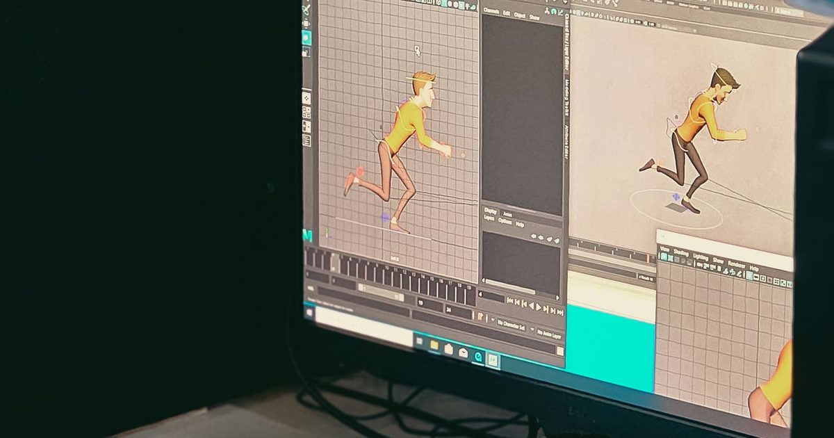 An animation studio workspace with sketches and a computer